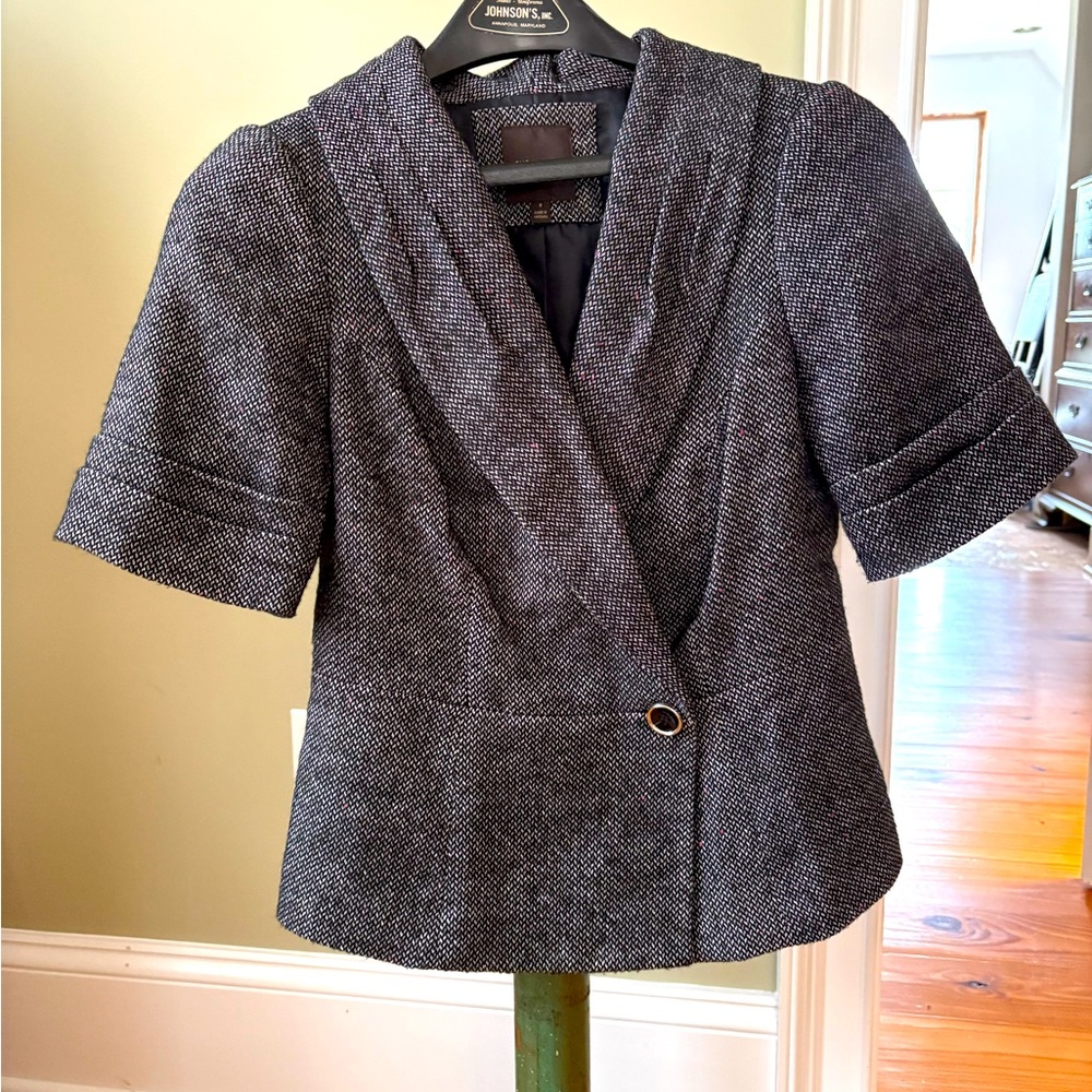Limited Short sleeve fitted jacket.